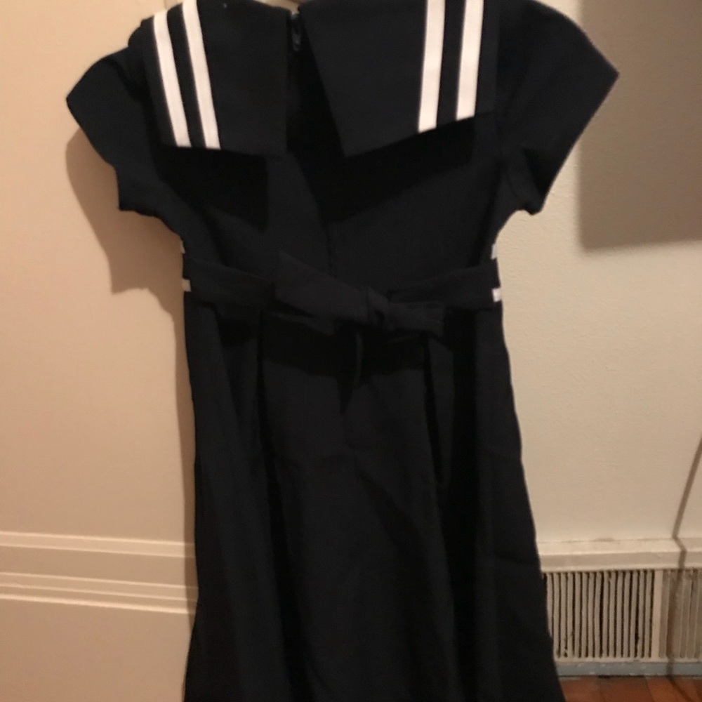 Little girl’s navy blue dress